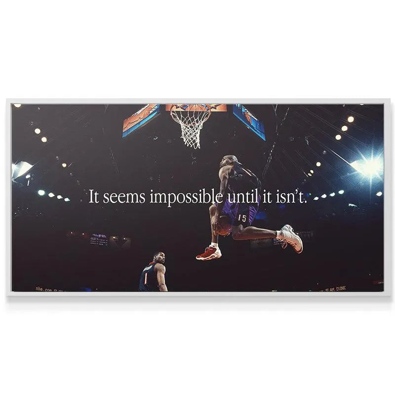 Lifestyle view showing the 'Vince Carter - Impossible' poster mounted above a modern office desk setup.