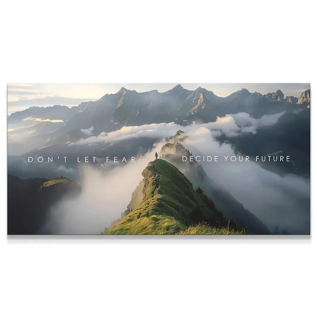 Panoramic view of a climber on a foggy mountain peak emphasizing 'Decide Your Future' text overlay.